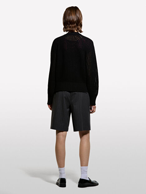 Resim Kadın Siyah Yün Karışımlı Tamamı Delikli Düğmeli Nervürlü Oversize Hırka